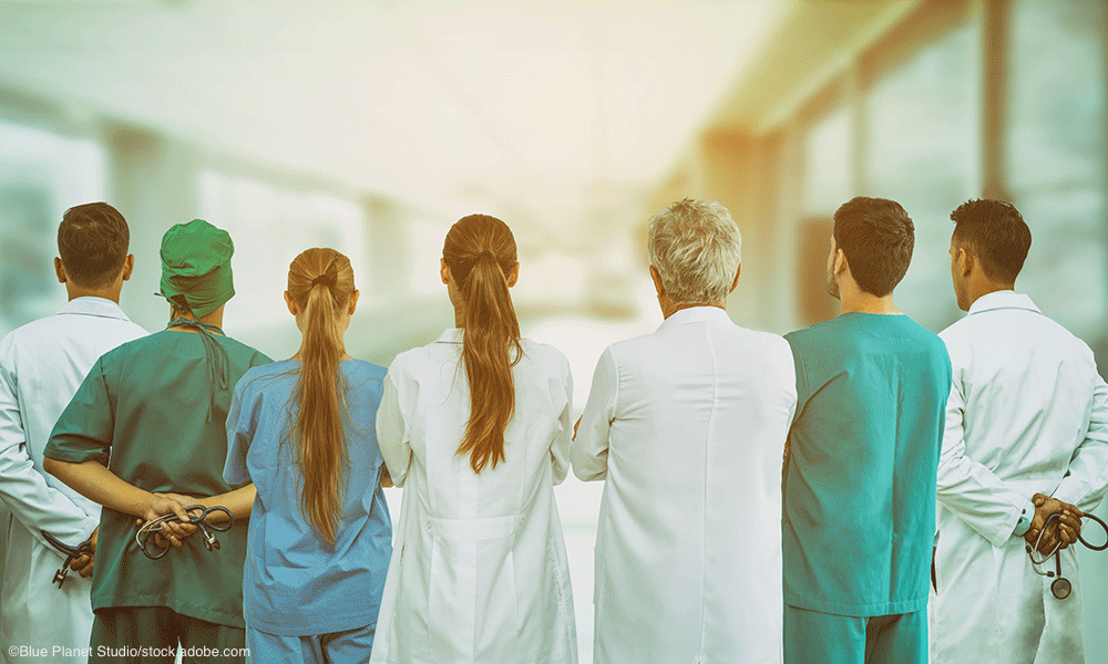 healthcare team facing away from viewer